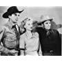 Russell Hayden, Lucille Lambert, and Bob Wills in The Lone Prairie (1942)