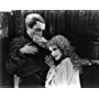 Mary Philbin and Conrad Veidt in The Man Who Laughs (1928)