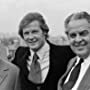 Roger Moore, Albert R. Broccoli, and Harry Saltzman