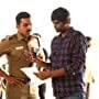 Karthi and H. Vinoth in Theeran Adhigaram Ondru (2017)