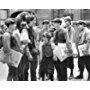 Christian Bale, Luke Edwards, and David Moscow in Newsies (1992)