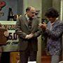 Frank Bonner, Gordon Jump, Richard Sanders, and John Wheeler in WKRP in Cincinnati (1978)