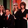 Bob Barker, Johnny Olson, and models "The Price is Right" 1982 CBS