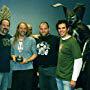 (L-R) Howard Berger, Greg Nicotero, and Bob Kurtzman of K.N.B. Efx, with Eli Roth, and the 2002 Sitges Film Festival trophy for best make-up effects.