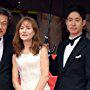 Isabelle Huppert, Sang-soo Hong, and Joon-Sang Yoo at an event for In Another Country (2012)
