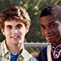 Jake Borelli as "Young Shawn" and Dalpre Grayer as "Young Gus" on the set of Psych. 