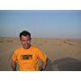 Neil Mandt on location in the Arabian Desert.