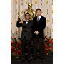 Academy Award®-winner Yojiro Takita (left) with presenter Liam Neeson backstage at the 81st Academy Awards® are presented live on the ABC Television network from The Kodak Theatre in Hollywood, CA, Sunday, February 22, 2009.