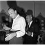 Frank Sinatra and Michael Romanoff in a London apartment