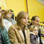 Charlize Theron, Woody Harrelson, Frances McDormand, and Elle Peterson in North Country (2005)