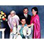 Sanjeev Bhaskar, Indira Joshi, Meera Syal, and Vincent Ebrahim in The Kumars at No. 42 (2001)