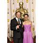 For Achievement in cinematography the Oscar® goes to cinematographer Anthony Dod Mantle, left, posing with presenter Natalie Portman, right, for the work done on "Slumdog Millionaire" (Fox Searchlight) during the live ABC Television broadcast of the 81st Annual Academy Awards® from the Kodak Theatre In Hollywood, CA Sunday, February 22, 2009.