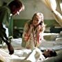 Izabella Scorupco, Stellan Skarsgård, and Remy Sweeney in Exorcist: The Beginning (2004)