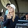 Emily (Caroline Sunshine) cheers on the Owls on and off the field. 