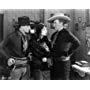 Joan Crawford, Tim McCoy, and Rex Lease in The Law of the Range (1928)