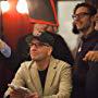 Jack Amiel, Steven Soderbergh, Michael Begler, and Greg Jacobs watch a rehearsal on the set of The Knick