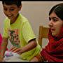 Toor Pekai Yousafzai, Atal Yousafzai and Malala Yousafzai in Birmingham, England.