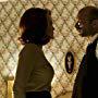 Carla Gugino and Frank Cassini in Watchmen (2009)