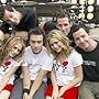 The band SIMPLE PLAN with MARY-KATE OLSEN and ASHLEY OLSEN. Bottom row - (l-r): JEFF STINCO, MARY-KATE, SEBASTIAN LEFEBVRE, ASHLEY and PIERRE BOUVIER. Top row - (l-r): DAVID DESROSIERS and CHUCK COMEAU.