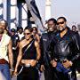 Members of the Black Knights, including (left to right) Soul Train (ORLANDO JONES), Half & Half (SALLI RICHARDSON-WHITFIELD), Rev. Maxwell (WREN T. BROWN) and their leader Smoke (LAURENCE FISHBURNE) revel in another victory.