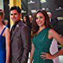 John Stamos, Autumn Reeser, and Kate Miner in Necessary Roughness (2011)