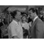 Roger Moore, Jan Holden, and Cec Linder in The Saint (1962)