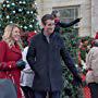 Brendan Fehr and Jodie Sweetin in Entertaining Christmas (2018)