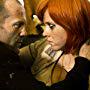 Jason Statham and Natalya Rudakova in Transporter 3 (2008)