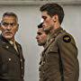 George Clooney, Christopher Abbott, and Pico Alexander in Catch-22 (2019)