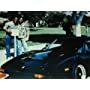 Eddie Murphy and Don Simpson with Ferrari from "Beverly Hills Cop".