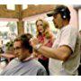 Director James B. Rogers shows Heather Graham how to give a bad haircut