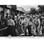 Ted Adams, George Chesebro, Augie Gomez, George Houston, Maxine Leslie, Carl Mathews, Hal Price, Al St. John, Wally West, and Jack Hendricks in The Lone Rider Ambushed (1941)