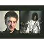 Brian May and John Deacon in Queen: Magic Years, Volume One - A Visual Anthology (1987)