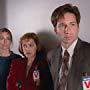 Gillian Anderson, David Duchovny, and Susanna Thompson in The X-Files (1993)