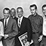 Scott Carpenter, John Glenn, Alan Shepard, John Stewart, The Kingston Trio, Bob Shane, and Nick Reynolds