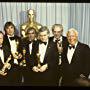 Farrah Fawcett, Nick Allder, Dennis Ayling, H.R. Giger, Brian Johnson, Carlo Rambaldi, and Harold Russell at an event for The 52nd Annual Academy Awards (1980)