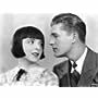 Larry Kent and Colleen Moore in Her Wild Oat (1927)