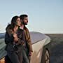 Logan Marshall-Green and Melanie Vallejo in Upgrade (2018)