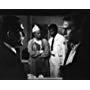 Steve McQueen, Georg Stanford Brown, and Don Gordon in Bullitt (1968)