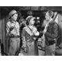 Stuart Crawford, Laraine Day, and Barry Nelson in A Yank on the Burma Road (1942)