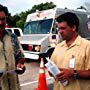 Patrick Warburton and Director Paul Sullivan discuss an upcoming scene.