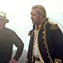 Russell Crowe and Peter Weir in Master and Commander: The Far Side of the World (2003)