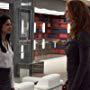 Sarah Rafferty and Aarti Mann in Suits (2011)