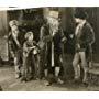 Jackie Coogan, Lon Chaney, and Edouard Trebaol in Oliver Twist (1922)