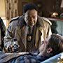 Isiah Whitlock Jr. and Monica Barbaro in The Good Cop (2018)