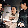 Ha-kyun Shin, Won Bin, and Hae-sook Kim in My Brother (2004)