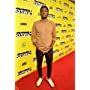 Curtiss Cook Jr. on red carpet of 