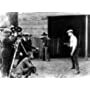 Pat Chrisman, Fred LeRoy Granville, Tom Mix, and Arthur Rosson in The Coming of the Law (1919)