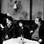 Charles Chaplin, Henry Bergman, Eric Campbell, and Edna Purviance in The Immigrant (1917)