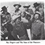 Roy Rogers, Pat Brady, Ken Carson, Hugh Farr, Karl Farr, Bob Nolan, Sons of the Pioneers, and Tim Spencer in Hands Across the Border (1944)